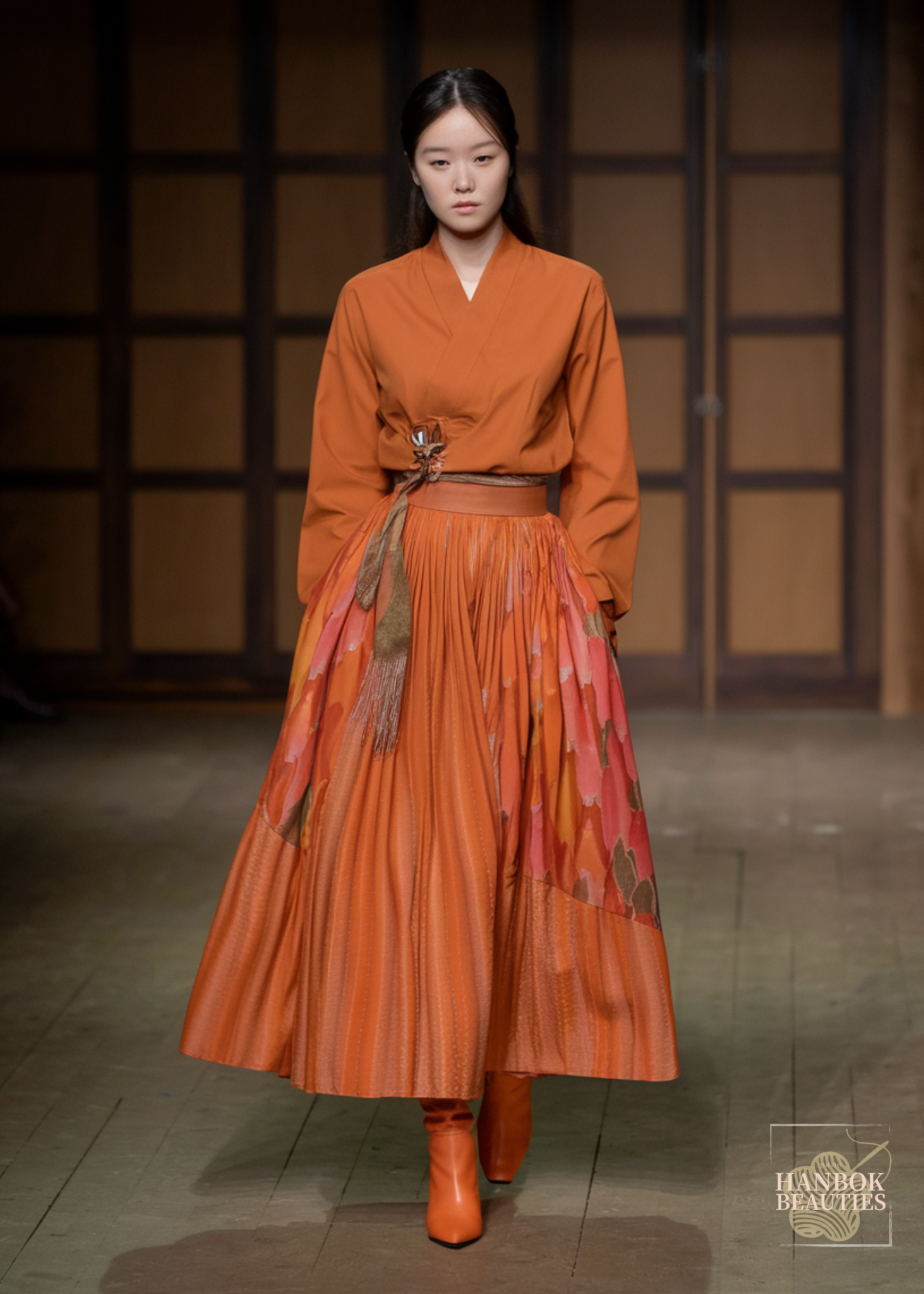 modern-hanbok-design-orange-wrap-jeogori-pleated-skirt-floral-pattern-runway-korean-fashion