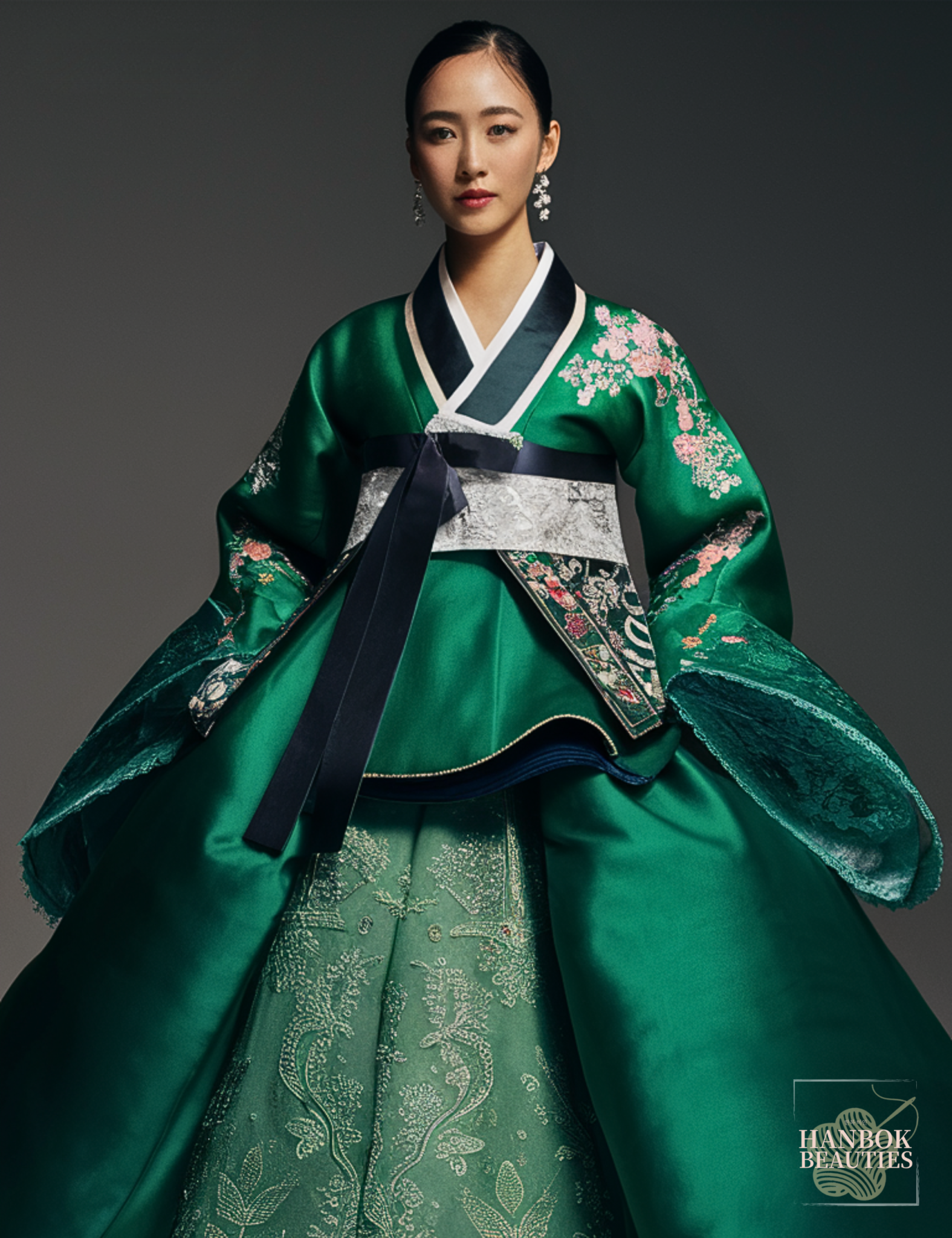 modern-hanbok-design-slim-silhouette-luxurious-fabrics-silk-brocade-rich-vivid-green-intricate-embroidery-delicate-lace-details-fusion-traditional-contemporary